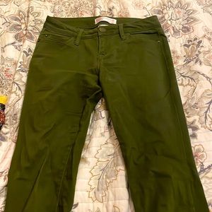 Dark greenish jeans. Not really that tight, comfy